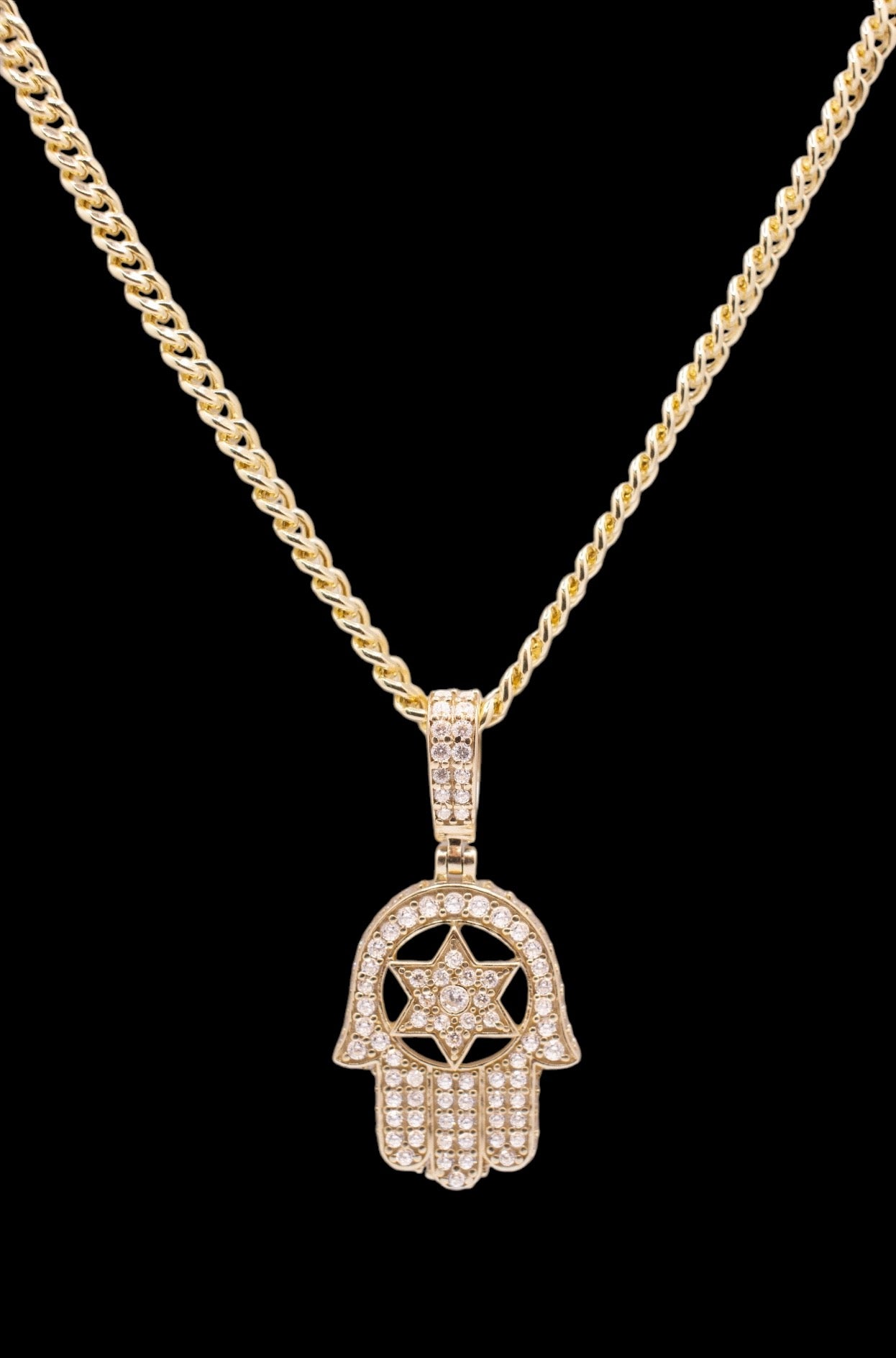 Hamsa pendant surrounded by CZ stones