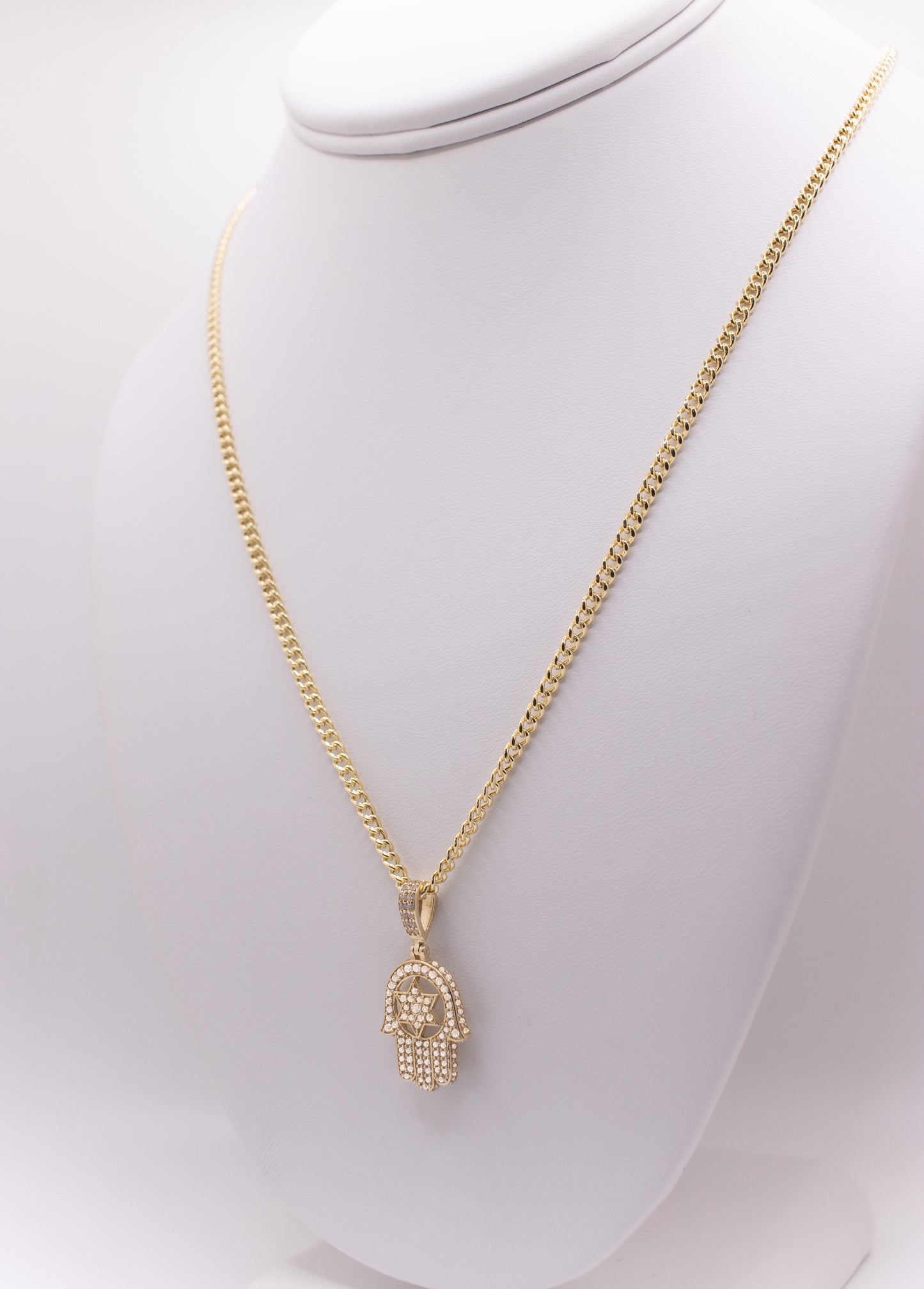 Hamsa pendant surrounded by CZ stones