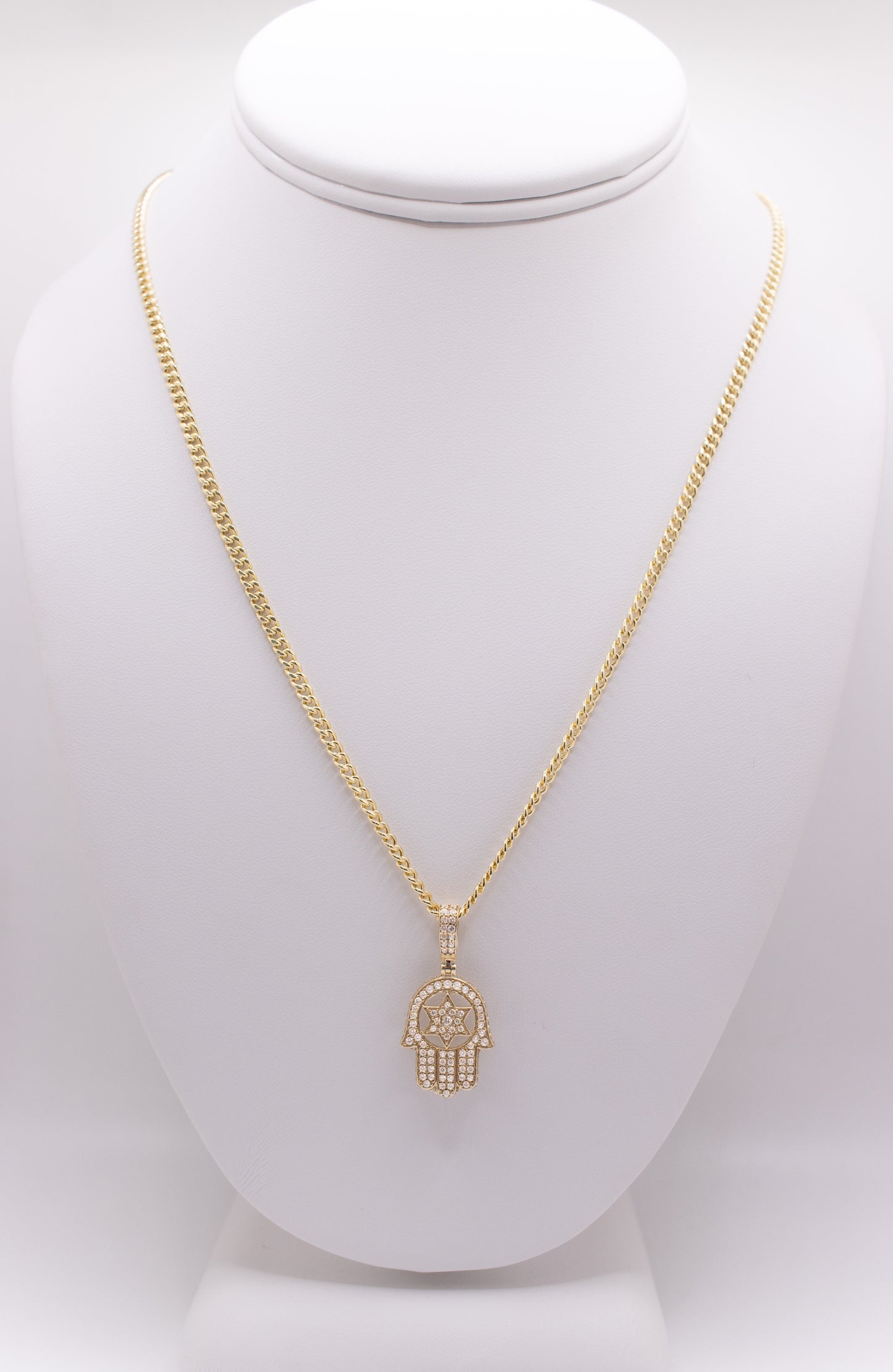 Hamsa pendant surrounded by CZ stones